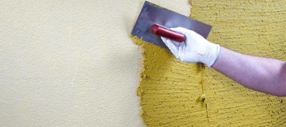 The process of applying textured plaster