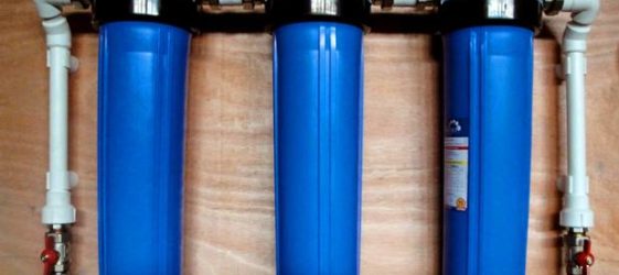 Flow-through main water filter for apartments and cottages